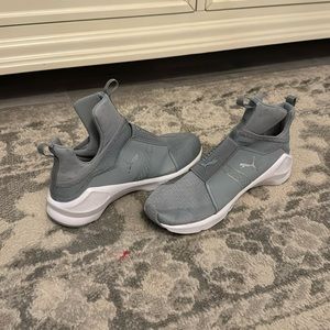 Women’s grey Puma sneakers